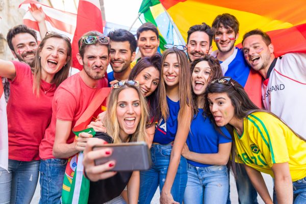 Happy Fans Taking Group Selfie